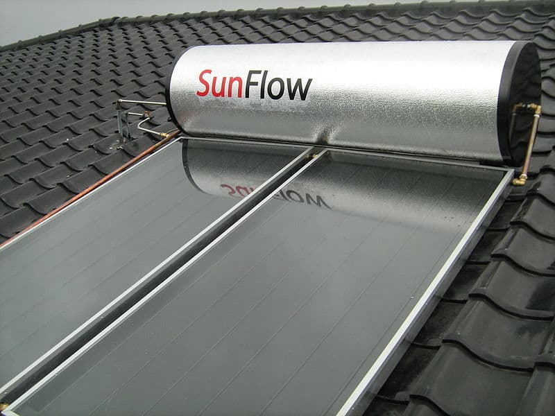 A solar flat plate collector on a roof.