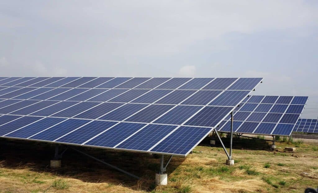 Solar panels mounted on the ground.